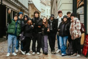 a group of young people standing next to each other